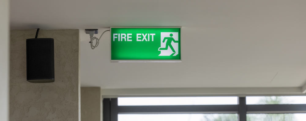 example of fire exit sign above bm trada fire doors